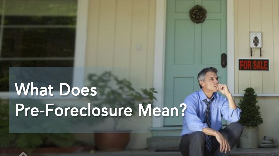 sad looking man sits forlonly on his steps of his house while he thinks about his foreclosure. There is a text superimposed on the picture that says what does pre-foreclosure mean